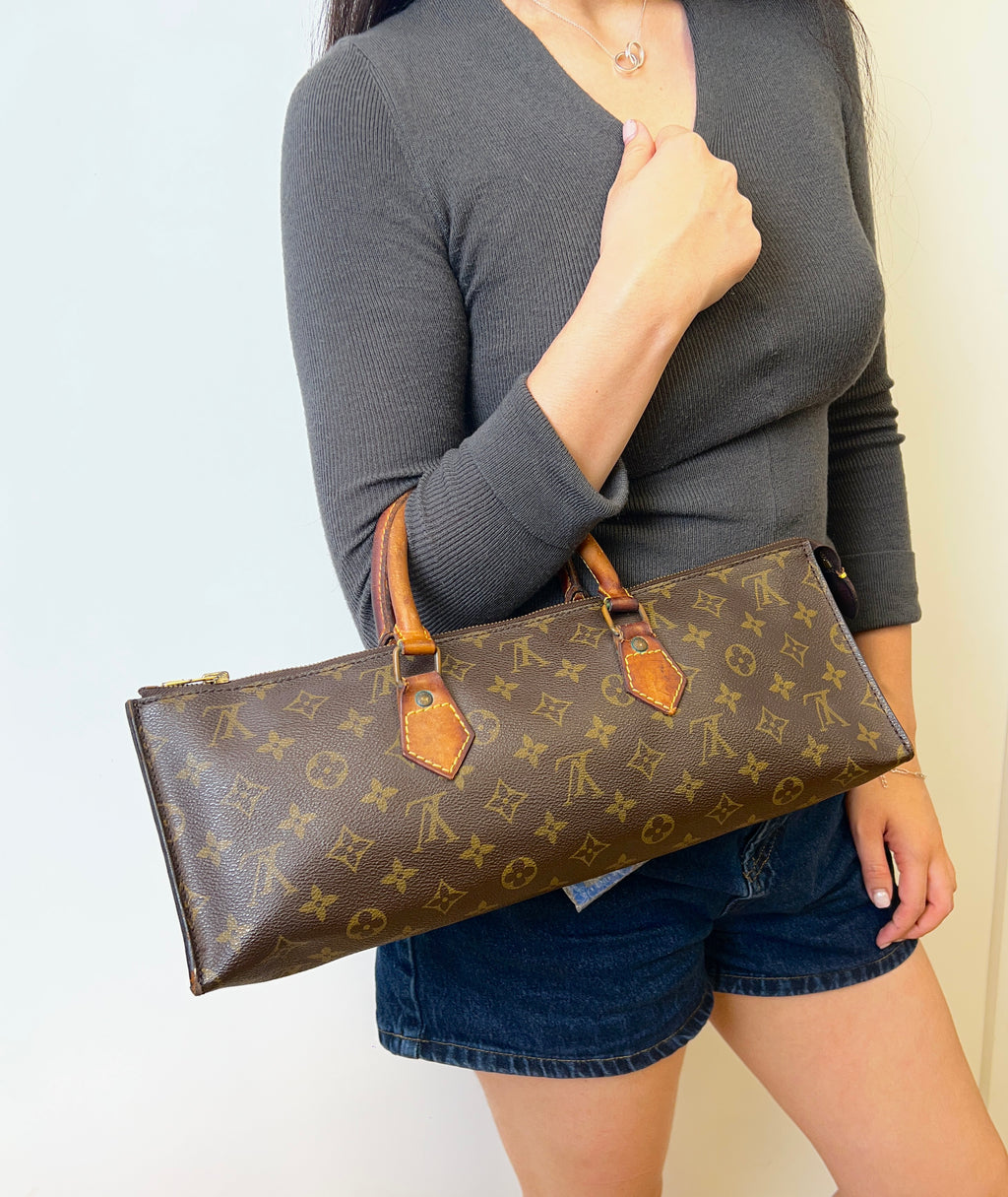 Louis Vuitton Monogram Sac Triangle Bag