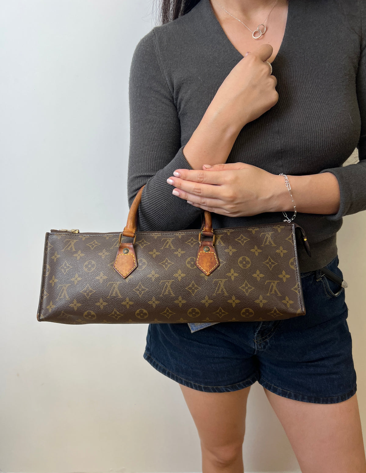 Louis Vuitton Monogram Sac Triangle Bag